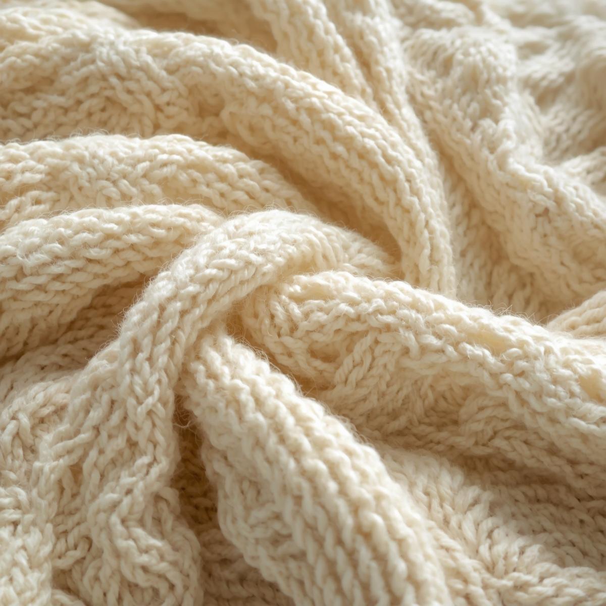 Hand-knitted merino wool throw blanket